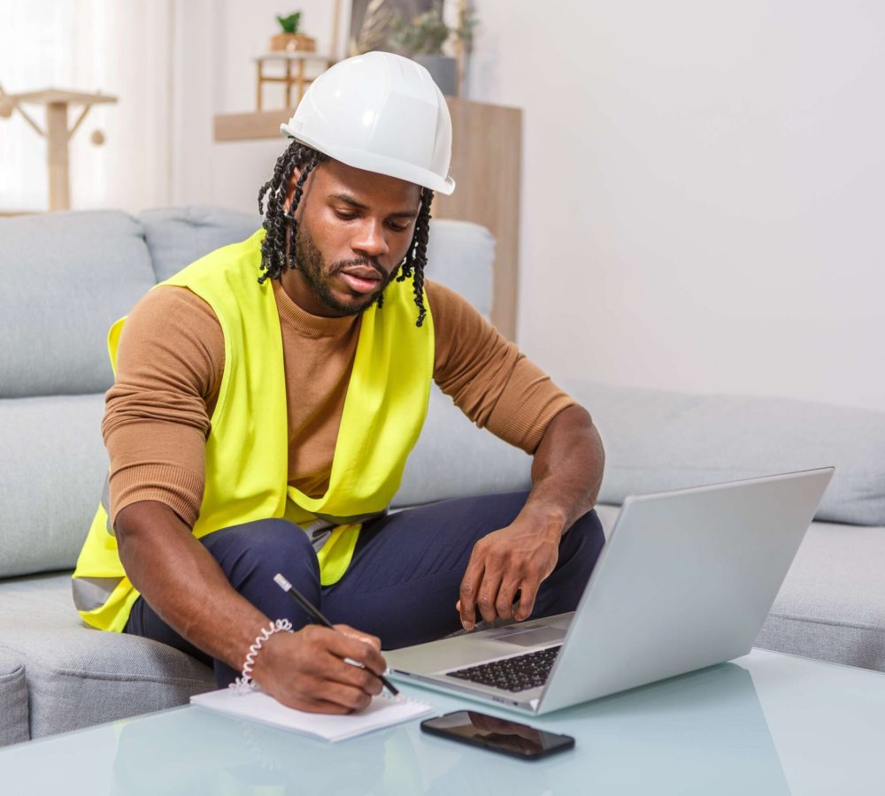construction-worker-reviews-blueprints-while-worki-2026-01-08-06-40-15-utc(1)