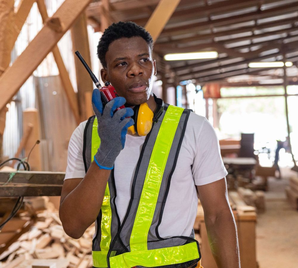 workshop-supervisor-communicating-via-walkie-talki-2026-02-16-16-51-59-utc(1)